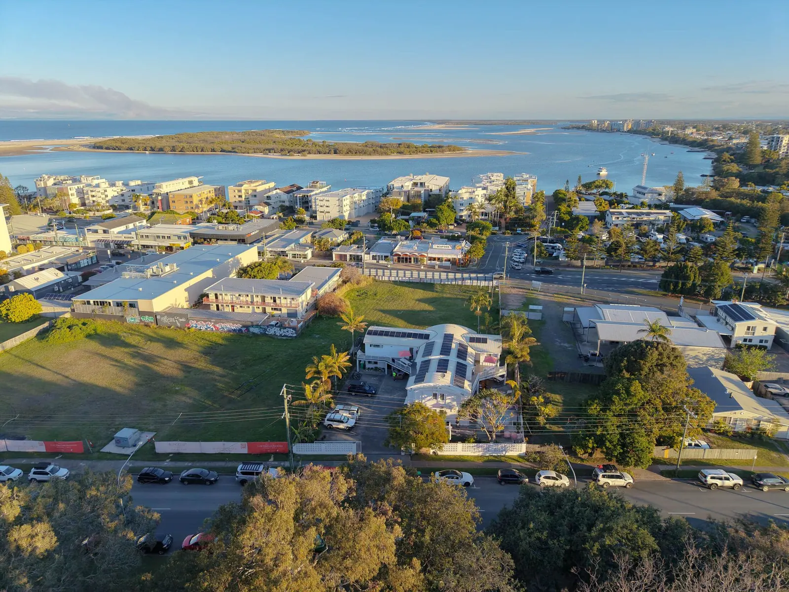 Aerial view of a hostel by the coast